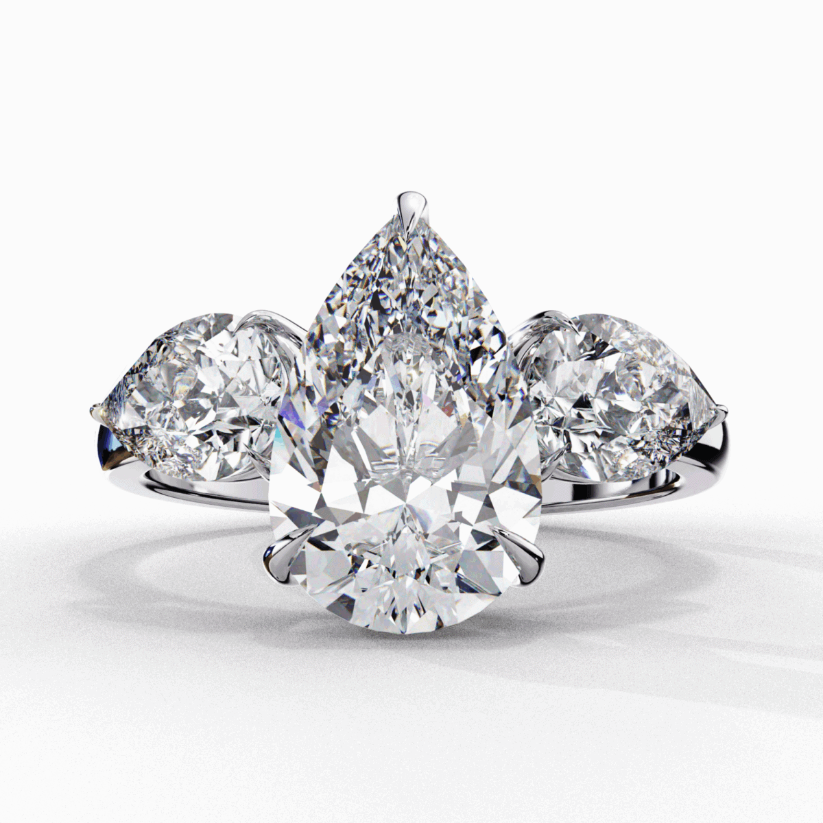 3 Carat Pear Cut Solitaire in Three Stone Setting  Image 1