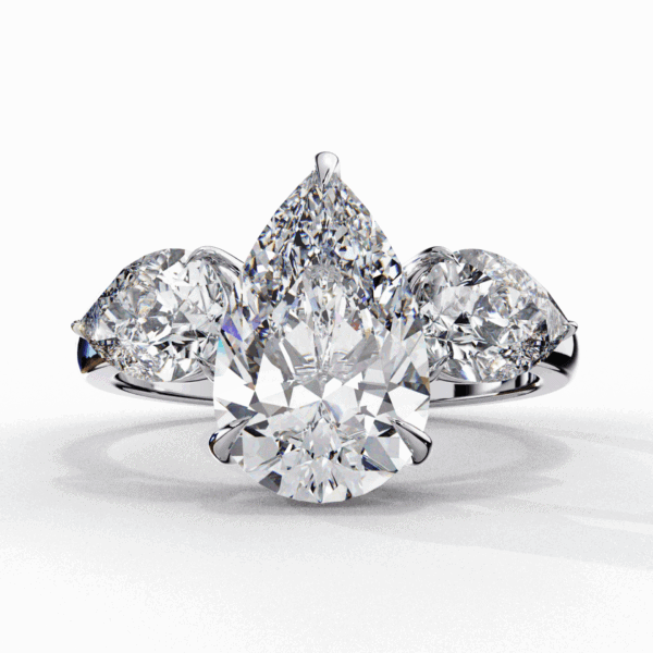 3 Carat Pear Cut Solitaire in Three Stone Setting