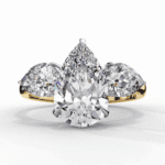 3 Carat Pear Cut Solitaire in Three Stone Setting - Image 6