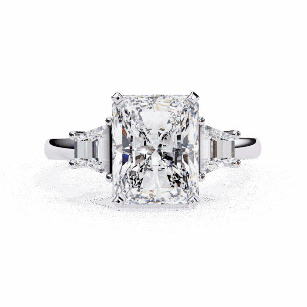 5.25 Carat Emerald Cut in Three Stone Solitaire Setting