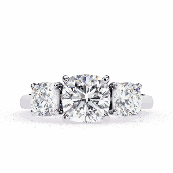 4 Carat Cushion Cut Solitaire in Three Stone Setting