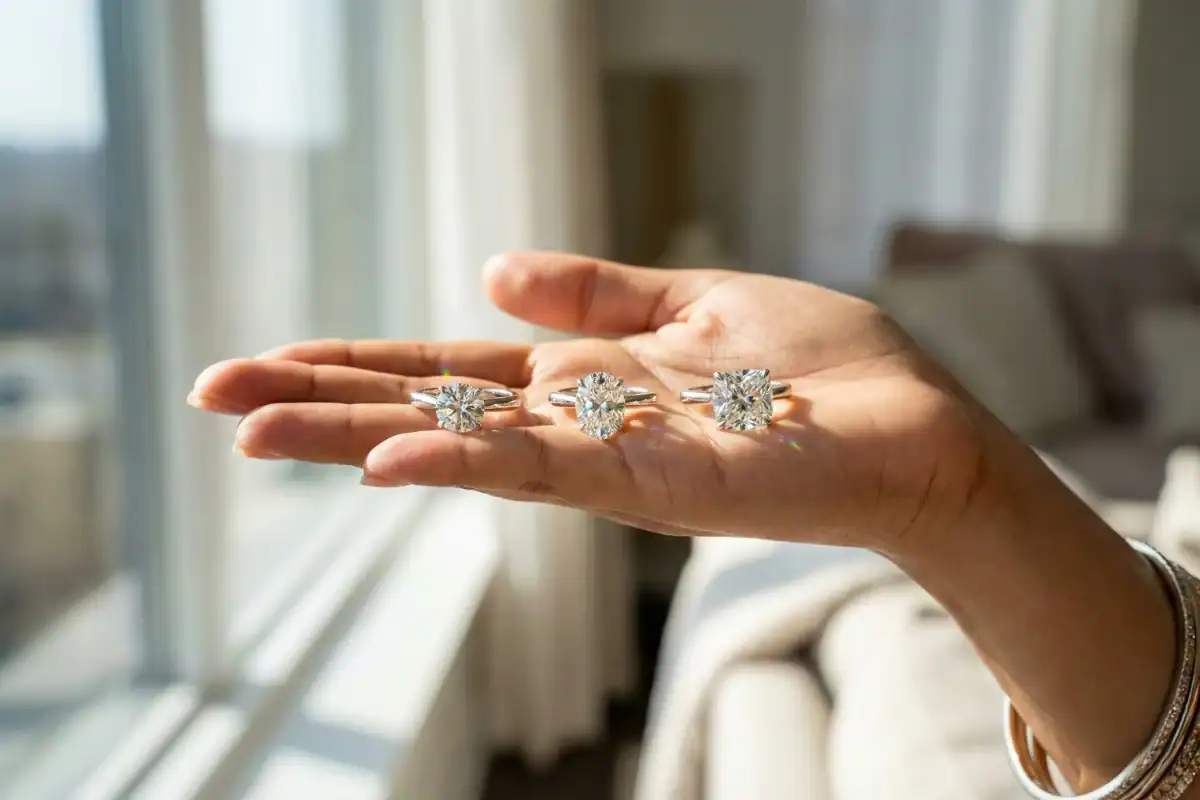 2 carat diamond ring size comparison showing how big 2 carats looks on finger compared to 1 carat and 3 carat