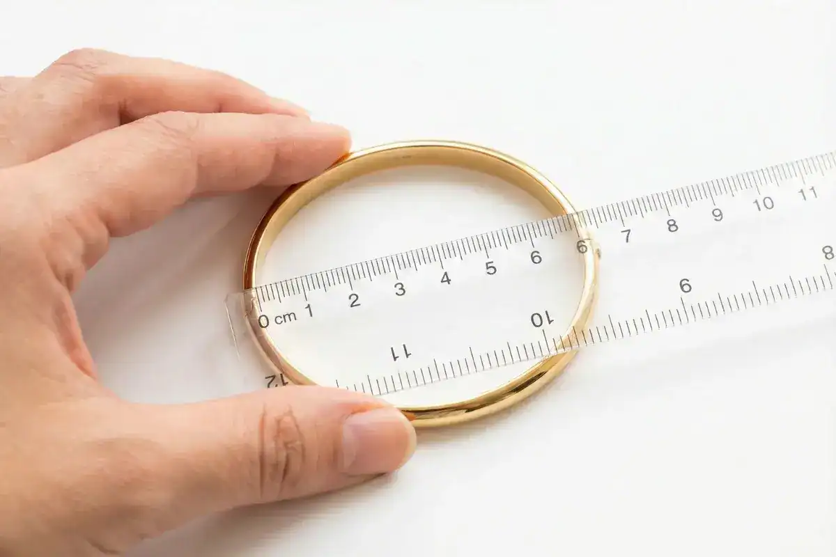 Measuring bangle inner diameter with ruler for Indian size chart