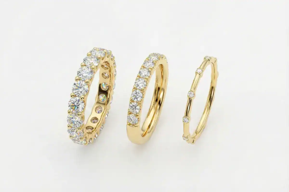 Three diamond band styles showing full eternity halfeternity and stackable designs in yellow gold