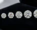 Lab grown diamond price in India showing five round brilliant diamonds from 0.5 to 3 carats on black velvet