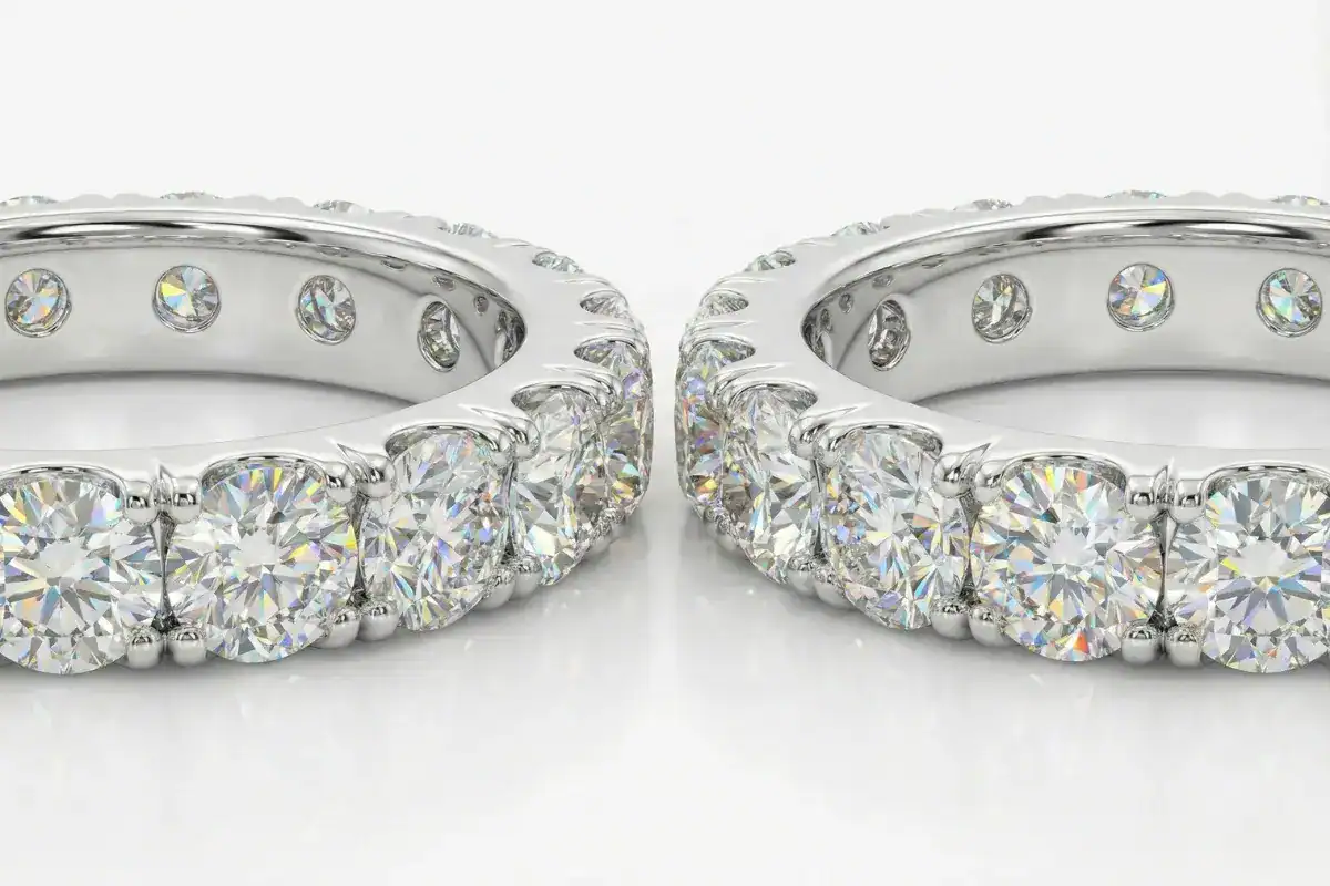 Side by side comparison of lab created and natural diamond eternity bands showing identical appearance
