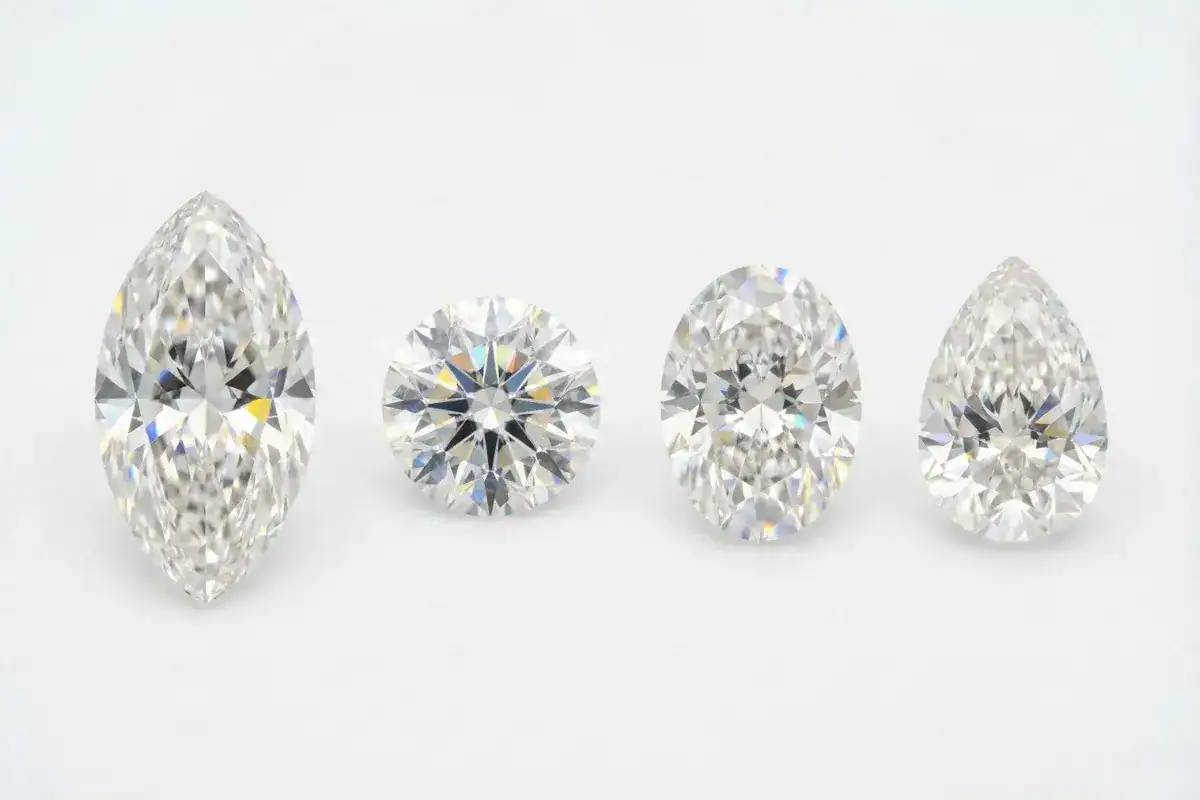 Marquise diamond compared to round oval and pear shapes side by side